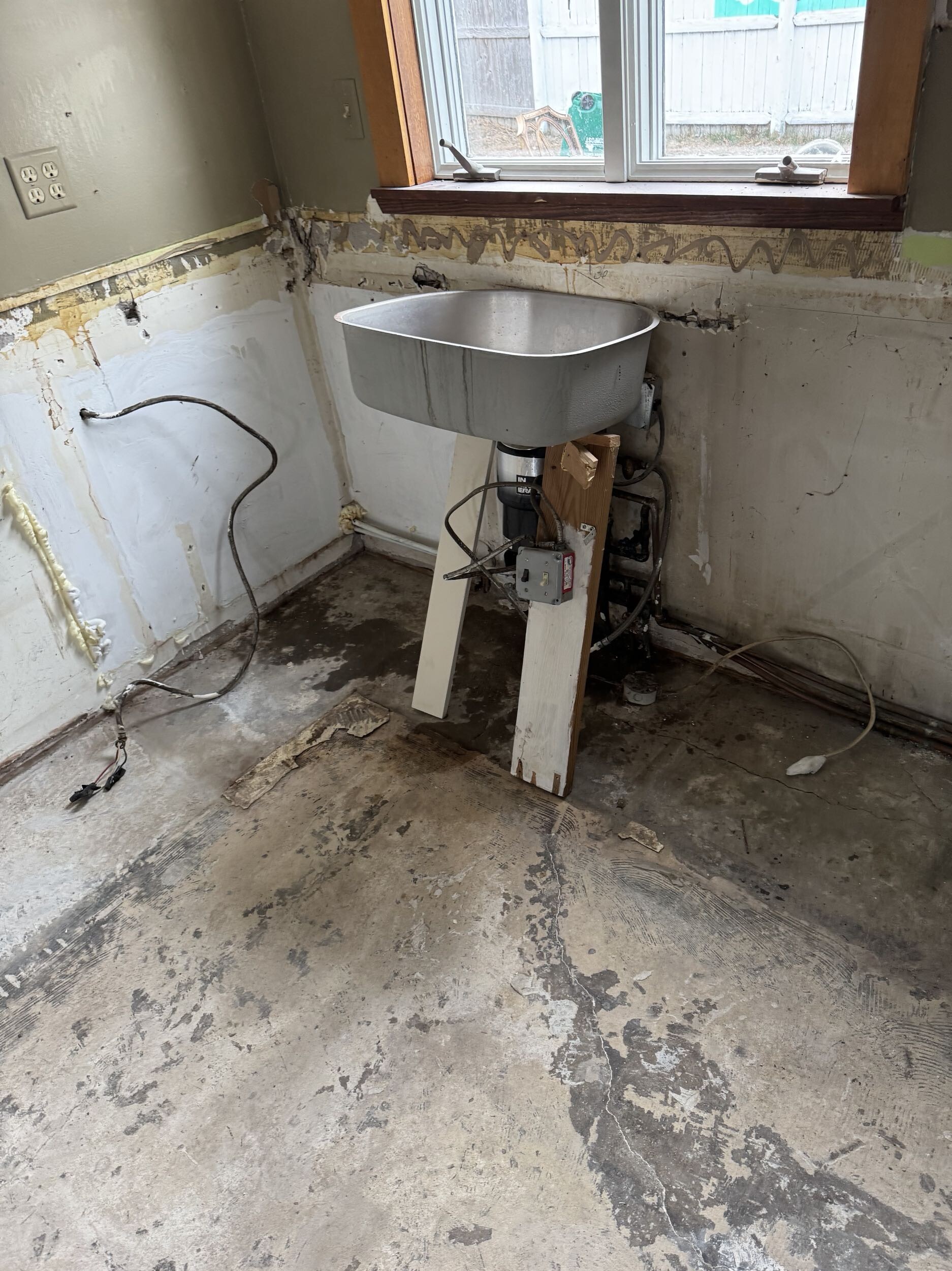 Rotted bathroom materials and mold damage